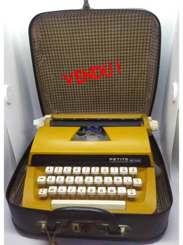 Machine à écrire vintage Petite International de luxe
